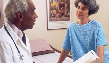 image: Elderly woman and nurse smiles